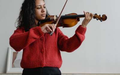 Playing a Violin at Heid Music
